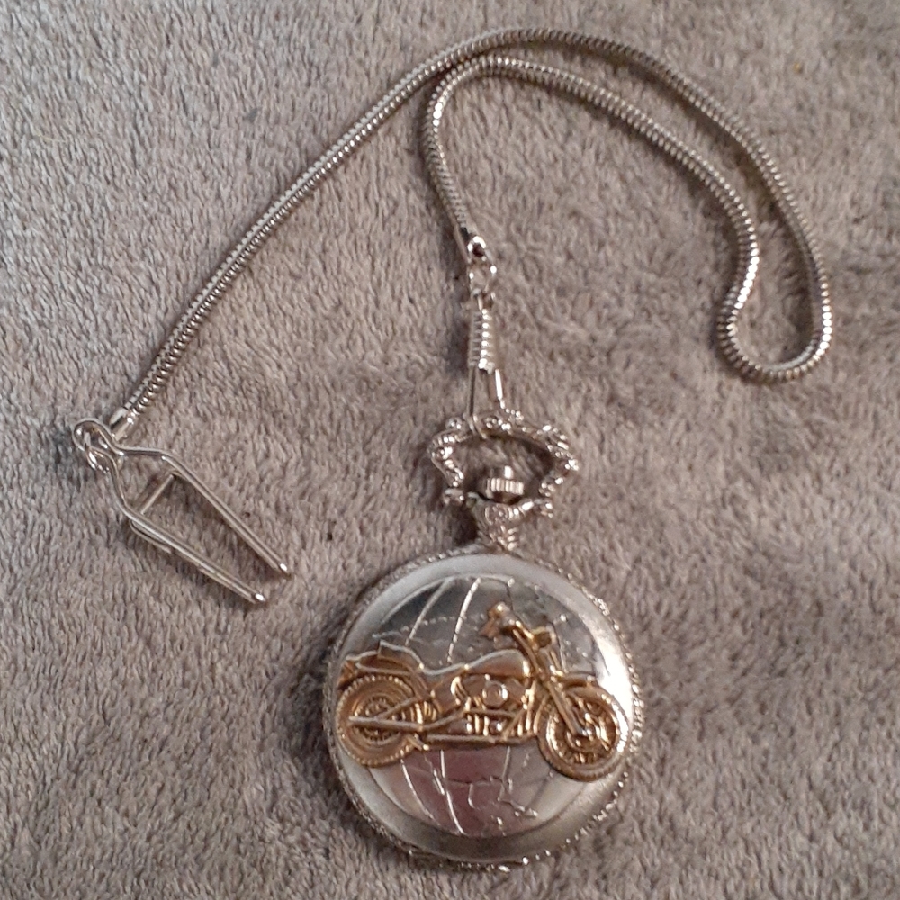 Hanslin Silver pocket watch with gold Motorcycle
